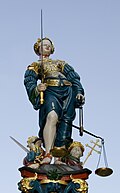 瑞士伯尔尼，汉斯‧吉恩(Hans Gieng)作于1543年的戴眼罩手持天秤及剑的正义女神像